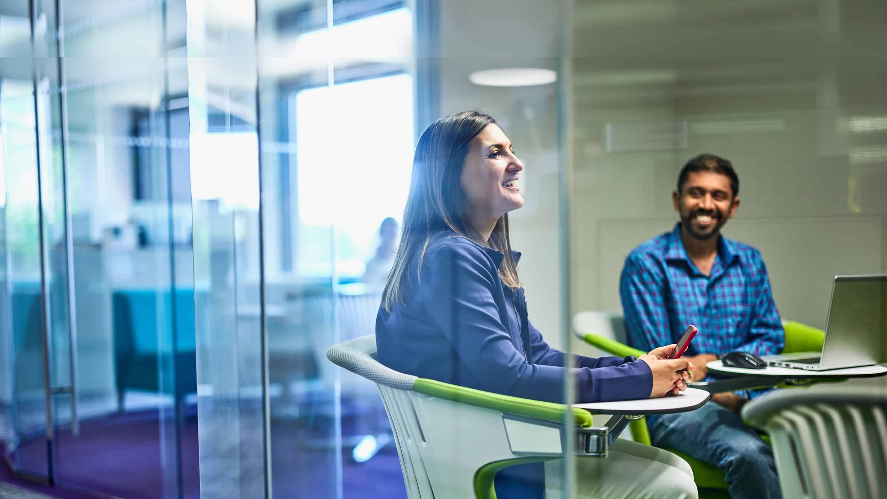 Female and male meeting in office